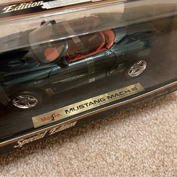 Maisto Special Edition Mustang Mach III Toy Car - Black and Red